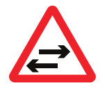 Two-way traffic crosses one-way road